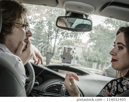 Man and woman in car Man and woman in car 114032405