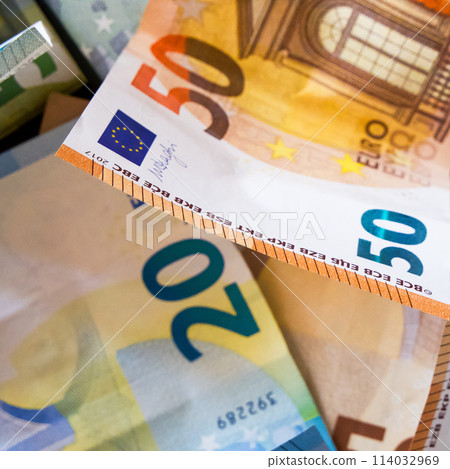 Euro Currency Focus. A close-up of 20 and 50 notes, highlighting the currencys design and colors. Euro Currency Focus. A close-up of 20 and 50 notes, highlighting the currencys design and colors. 114032969