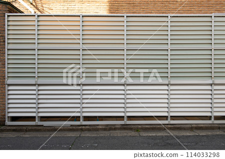 street wall background ,Industrial background, empty grunge urban street with warehouse brick wall 114033298