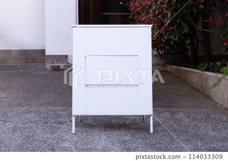 Large blank billboard on a street wall, banners with room to add your own text 114033309