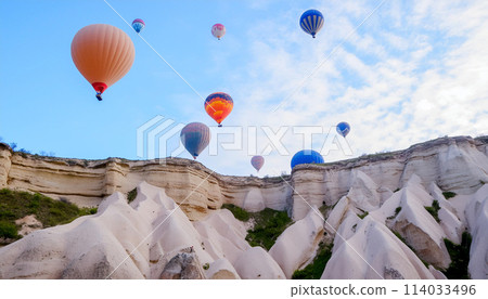 Many Hot Air Balloons In Cappadocia Turkey Many Hot Air Balloons In Cappadocia Turkey 114033496