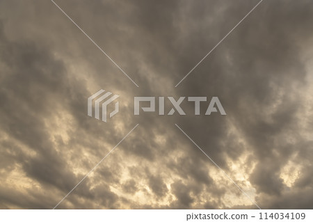 beautiful sky with slowly moving clouds in the sky at dusk 114034109