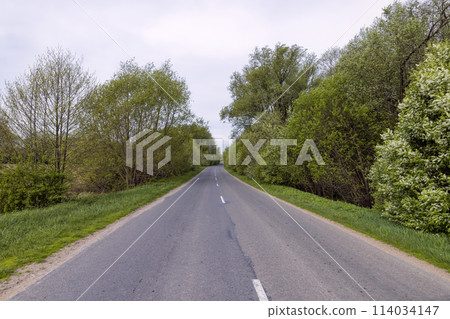 windy cloudy weather and highway in rural areas windy cloudy weather and highway in rural areas 114034147