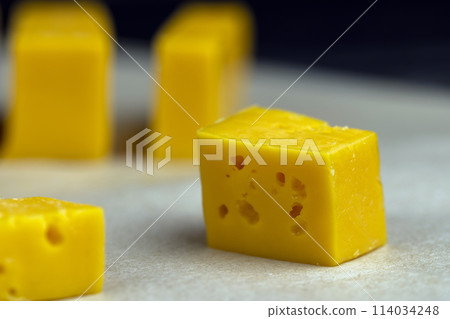 high-quality long-aged orange cheese made from milk high-quality long-aged orange cheese made from milk 114034248