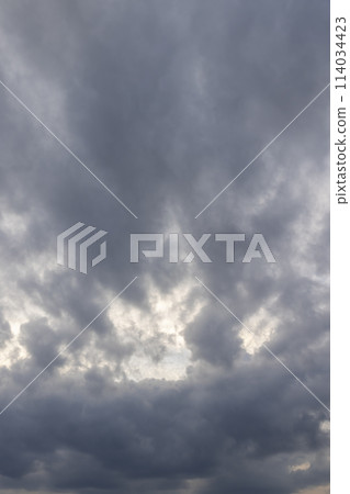 beautiful sky with slowly moving clouds in the sky at dusk beautiful sky with slowly moving clouds in the sky at dusk 114034423