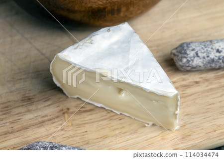 pieces of cream cheese with white mold pieces of cream cheese with white mold 114034474
