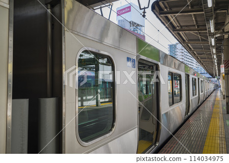 Train seen from inside the car, Train stopping at the platform, Yamanote Line, Priority seats, Inside the car (E235 series) Train seen from inside the car, Train stopping at the platform, Yamanote Line, Priority seats, Inside the car (E235 series) 114034975