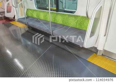 Train seen from inside the car, Train stopping at the platform, Yamanote Line, Priority seats, Inside the car (E235 series) Train seen from inside the car, Train stopping at the platform, Yamanote Line, Priority seats, Inside the car (E235 series) 114034976