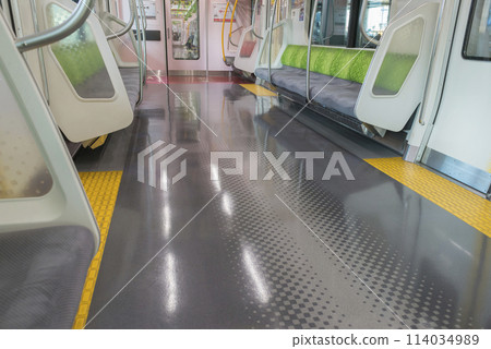 Train seen from inside the car, Train stopping at the platform, Yamanote Line, Priority seats, Inside the car (E235 series) Train seen from inside the car, Train stopping at the platform, Yamanote Line, Priority seats, Inside the car (E235 series) 114034989