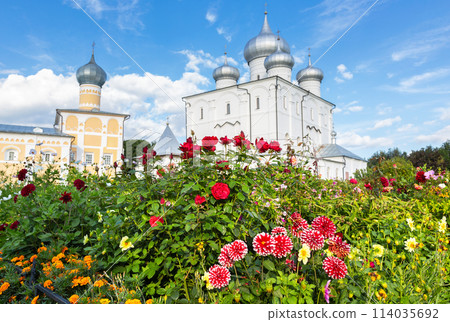 Decorative flowers against the background of the Orthodox church in the Khutynsky monastery in Veliky Novgorod, Russia. Selective focus 114035692