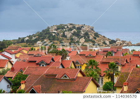 complex of houses with red roofs against the backdrop of the sea in Northern Cyprus 19 114036570