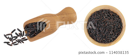 Black rice in a wooden scoop and bowl isolated on white background. Top view. Flat lay 114038135