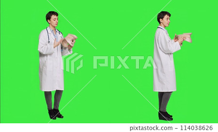 Physical therapy medic presents a cervical medical foam to help with rehabilitation after bone fracture or injuries. Woman physician having orthopedics expertise and neck brace. Camera A. 114038626