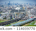 Tokyo cityscape with train running on the tracks 114039770