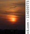Sunset and silhouette of an airplane 114039773