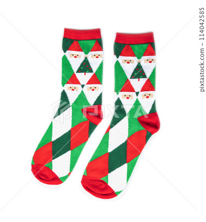 Red and green striped socks on white background 114042585
