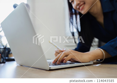 Business woman, freelance hand typing and laptop in home for remote work, internet search or blog Business woman, freelance hand typing and laptop in home for remote work, internet search or blog 114043585