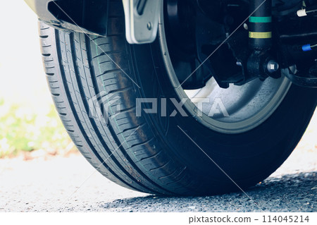 Rear tires of a car 114045214