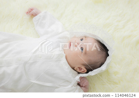 Lying down baby 114046124