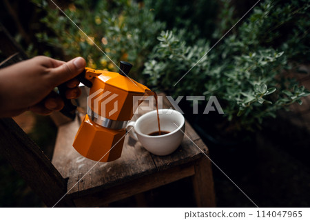 Coffee from a moka pot in the morning 114047965