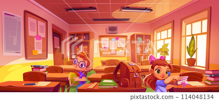 Little kids with books in school classroom. Little kids with books in school classroom. 114048134