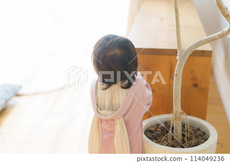 Mischievous baby 114049236