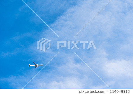 Airplane flying blue sky 114049513