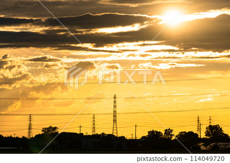 Steel towers at sunset 114049720