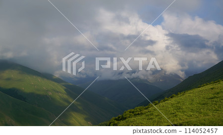 Mountains and clouds in dusk 114052457