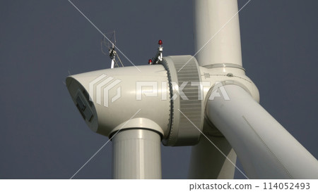 Windmill or wind turbine closeup in rotation 114052493