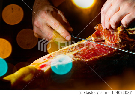 Dry Spanish ham, Jamon Serrano, Bellota, Italian Prosciutto Crudo or Parma ham. Dry Spanish ham, Jamon Serrano, Bellota, Italian Prosciutto Crudo or Parma ham. 114053087