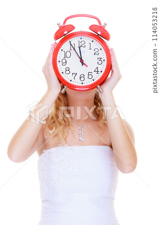 Woman bride holding big red clock Woman bride holding big red clock 114053218