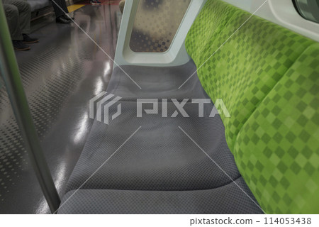 Train seen from inside the car, Train stopping at the platform, Yamanote Line, Priority seats, Inside the car (E235 series) Train seen from inside the car, Train stopping at the platform, Yamanote Line, Priority seats, Inside the car (E235 series) 114053438