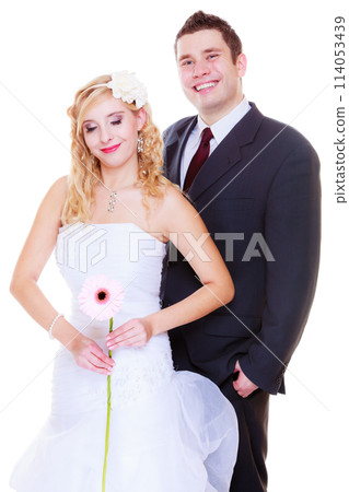 Happy groom and bride posing for marriage photo Happy groom and bride posing for marriage photo 114053439