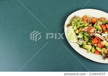 Vegetable salad with seafood. 114054257