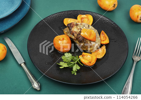 Baked pork meat with medlar or loquat. 114054266