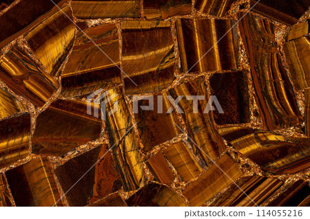 Tigers Eye Golden natural semi precious luxury brown stone texture. Tigers Eye Golden natural semi precious luxury brown stone texture. 114055216