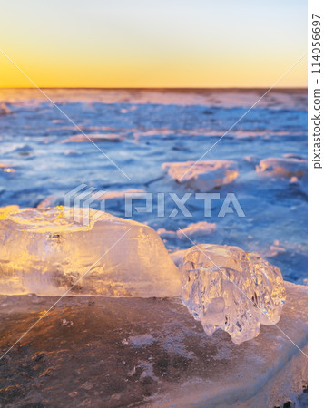 Jewelry ice on Otsu Coast in the morning glow at the mouth of the Tokachi River in Hokkaido in winter Jewelry ice on Otsu Coast in the morning glow at the mouth of the Tokachi River in Hokkaido in winter 114056697
