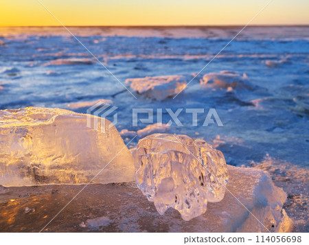 Jewelry ice on Otsu Coast in the morning glow at the mouth of the Tokachi River in Hokkaido in winter 114056698