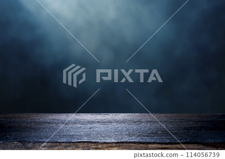 Rustic Wooden Table Surface with Misty Dark Blue Background. Rustic Wooden Table Surface with Misty Dark Blue Background. 114056739