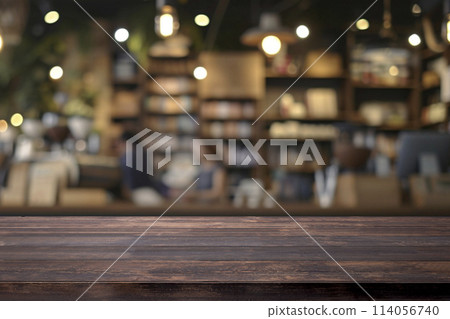 Empty wooden table for present product on coffee shop blur background. Empty wooden table for present product on coffee shop blur background. 114056740