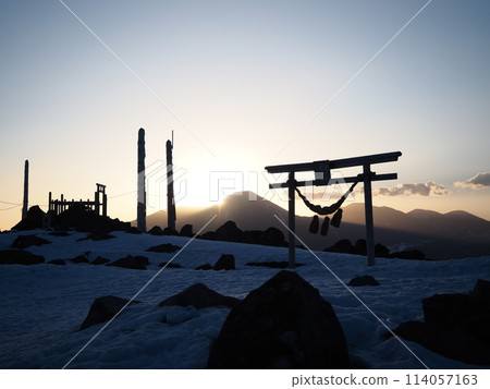 Torii gate and sunrise on the mountaintop Torii gate and sunrise on the mountaintop 114057163