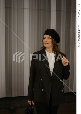 Beautiful lonely girl in black posing in the subway. Beautiful lonely girl in black posing in the subway. 114057244