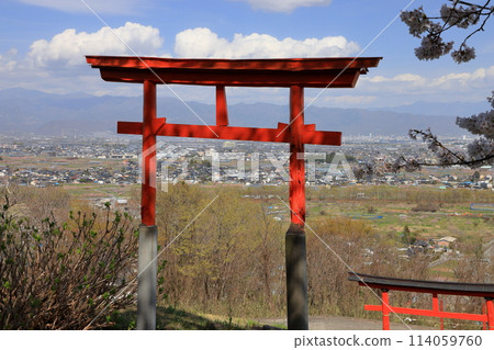 The view from the torii gate of Misaki Shrine, a cherry blossom shrine built on a hill overlooking the Kofu Basin in Kamimiyaji, Minami-Alps City, Yamanashi Prefecture The view from the torii gate of Misaki Shrine, a cherry blossom shrine built on a hill overlooking the Kofu Basin in Kamimiyaji, Minami-Alps City, Yamanashi Prefecture 114059760