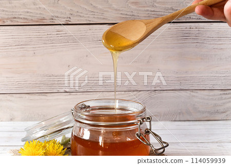 Dandelion jam in a glass jar. The concept of health. Life without cholesterol. 114059939