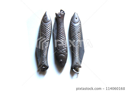 fish shape metal knifes isolated fish shape metal knifes isolated 114060168