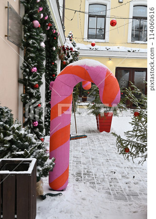 A Christmas tree on the street decorated with Christmas toys. Decoration for New Year and Christmas 114060616