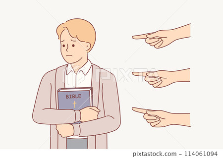 Sad christian man with bible, feeling persecution and oppression, from people pointing fingers 114061094