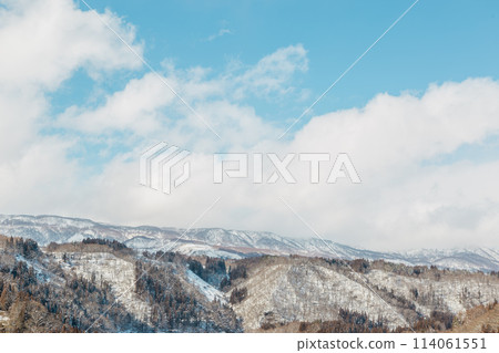 Beautiful winter scenery with blue sky and snowy mountains Beautiful winter scenery with blue sky and snowy mountains 114061551