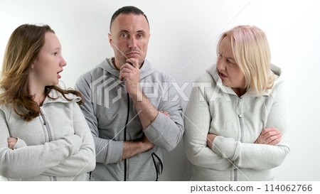 family quarrel women against men two girls mother and daughter scold father wave hands man covers his face in horror bad relationship showdown family quarrel women against men two girls mother and daughter scold father wave hands man covers his face in horror bad relationship showdown 114062766